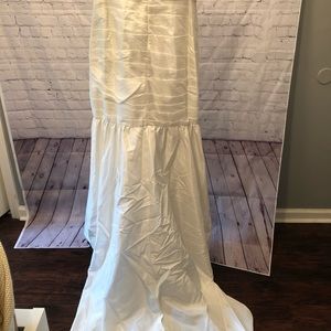 Strapless wedding dress with a train